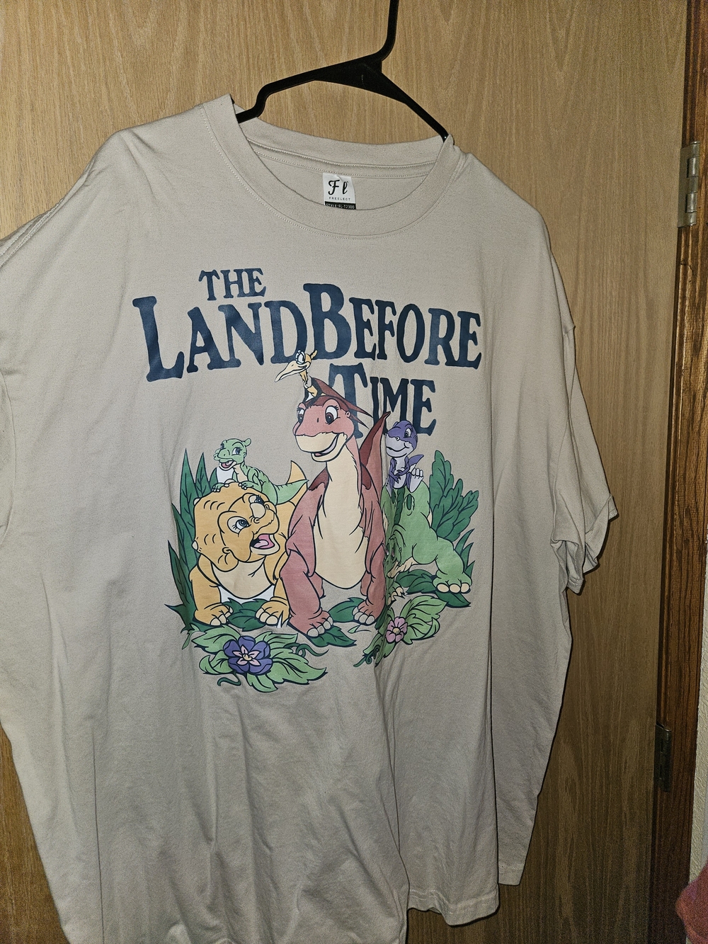 Source Unknown The Land Before Time Graphic Tee - Cream with Multicolor Print